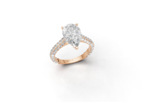 18K Gold Pear and Round Diamond Ring