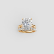 18K Gold Pear and Round Diamond Ring – 4.17CT