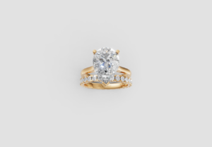 18K Gold Pear and Round Diamond Ring – 4.17CT