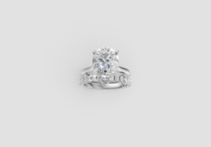 18K Gold Pear and Round Diamond Ring – 4.17CT